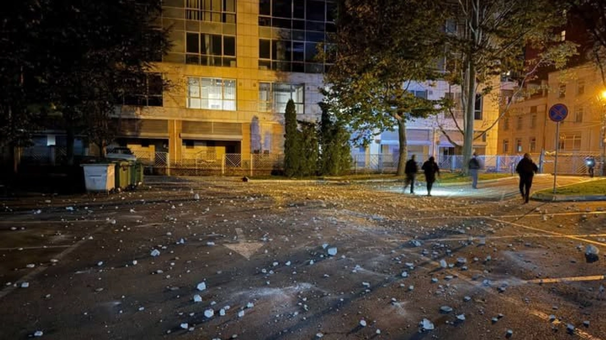 Russian drone attack sets business centre in central Dnipro on fire, debris falls on city council car park – photos